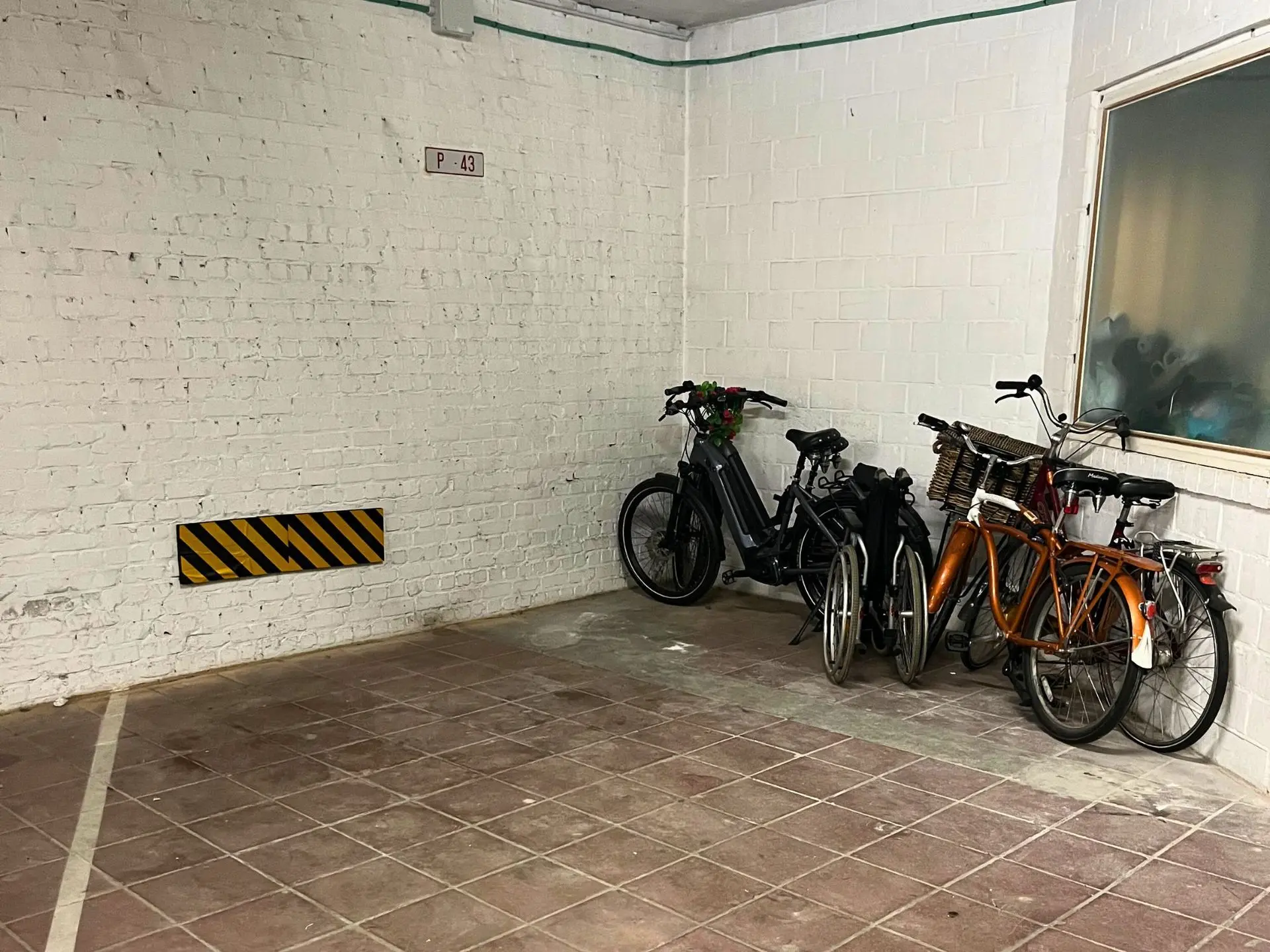 Place de parking privé du Seaside avec les vélos disponible